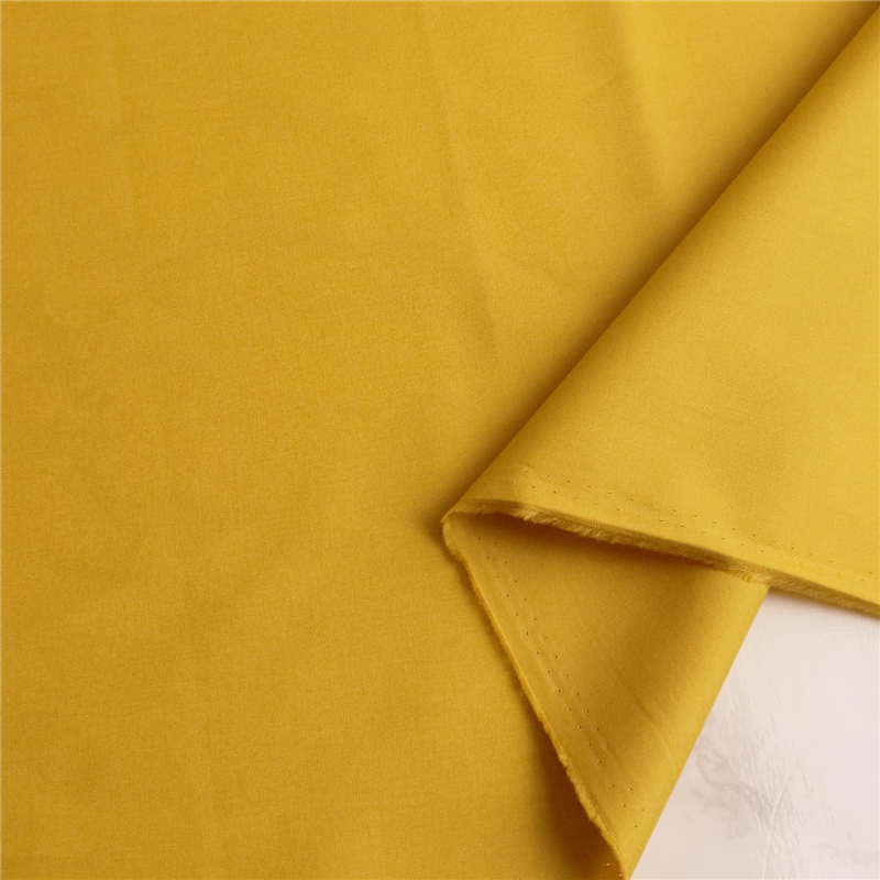 日本紐釦貿易 ブロード生地 無地 巾約112cm 4mカット アストラゴールド B64500-17-4M 1枚（ご注文単位1枚）【直送品】