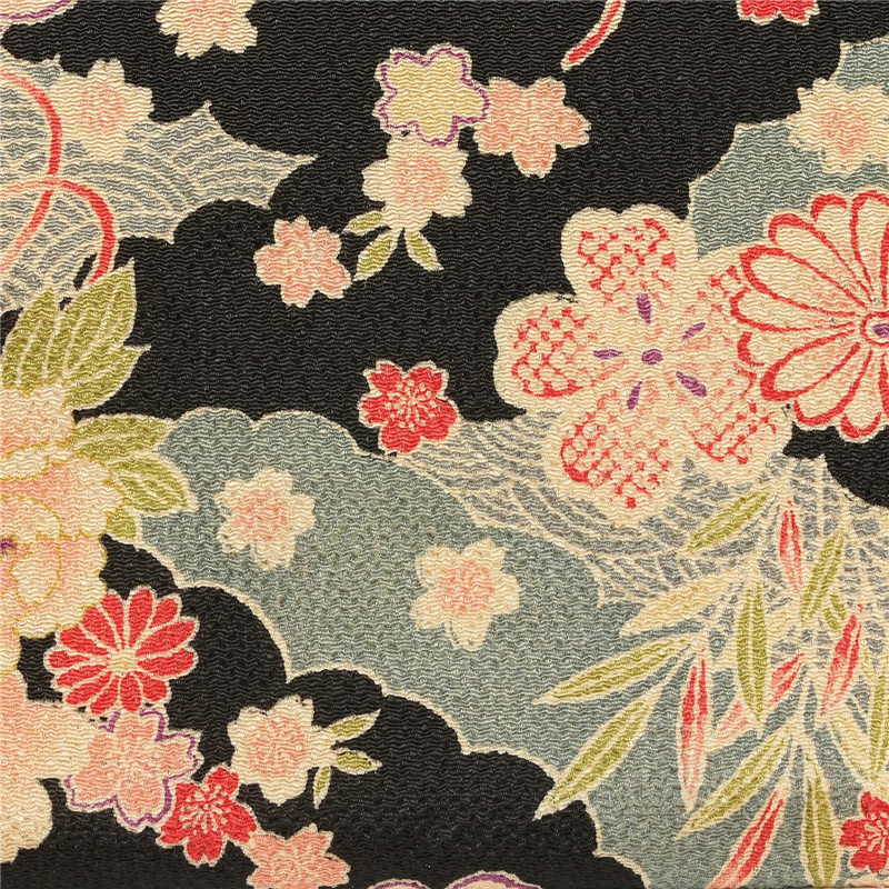 日本紐釦貿易 ちりめん 金彩 椿柄 黒 巾約70cm×10ｍ切売カット DS03-06-10M 1枚（ご注文単位1枚）【直送品】
