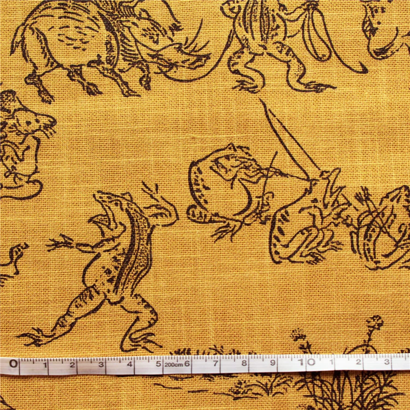 日本紐釦貿易 鳥獣戯画 むら糸藍染調 プリント生地 カラシ×黒線 巾約110cm 1mカット KW7070-7J-1M 1枚（ご注文単位1枚）【直送品】