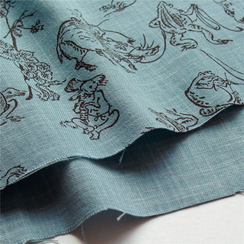 日本紐釦貿易 鳥獣戯画 むら糸藍染調 プリント生地 水色×黒線 巾約110cm 2mカット KW7070-7K-2M 1枚（ご注文単位1枚）【直送品】