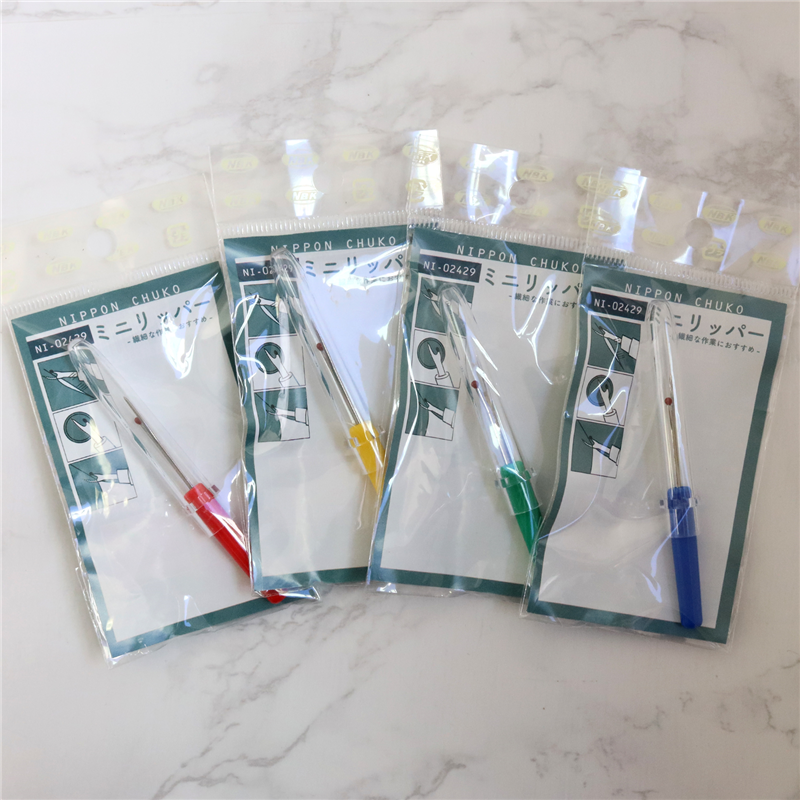 日本紐釦貿易 ミニリッパー 全長約6.5cm 赤・青・黄・緑ランダム NI-02429 (ご注文単位1束)【直送品】