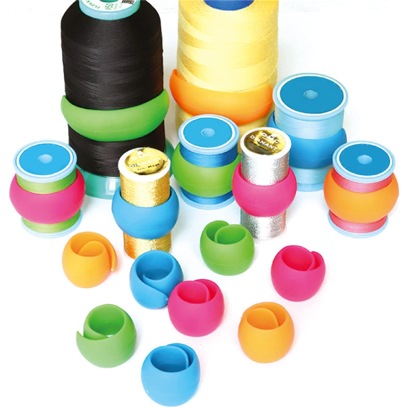 日本紐釦貿易 カラフルボビン糸ホルダー 2.7~8.7cm調節可能 4色×各1個 NI-02437 (ご注文単位1束)【直送品】