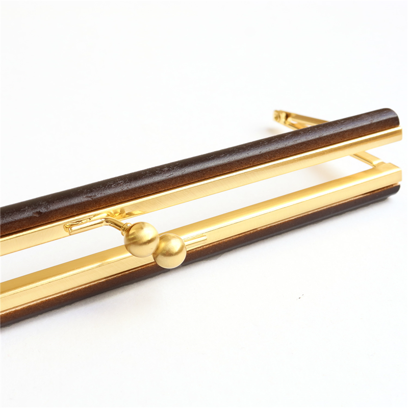 日本紐釦貿易 ウッドバー付き浮足口金 大 チョコ TYK5-C (ご注文単位1本)【直送品】