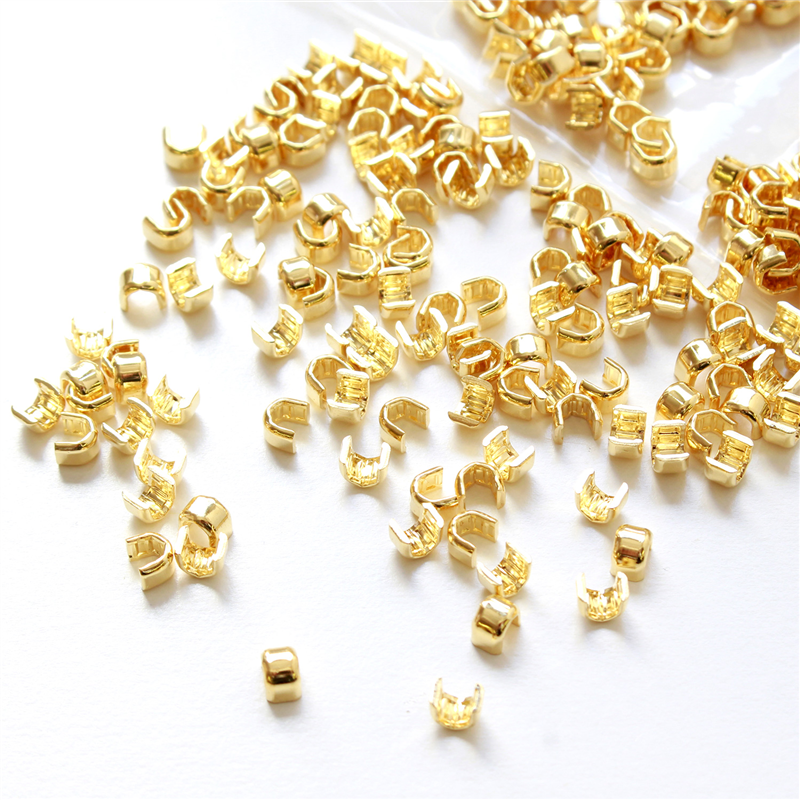 日本紐釦貿易 YKK 5番金属ファスナー用上止め金具 500組入[1000ケ] ゴールド F2-213-500 （ご注文単位1束）【直送品】