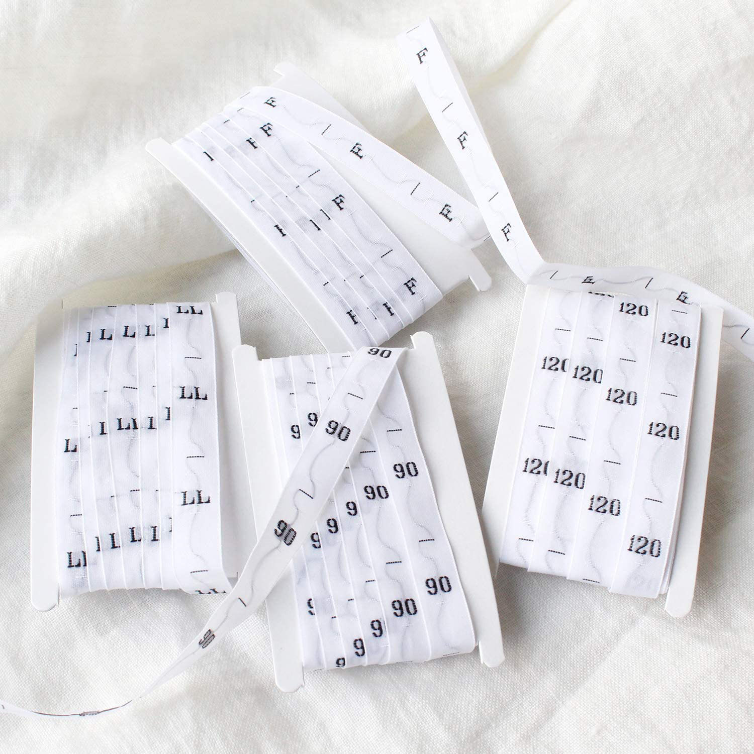 日本紐釦貿易 サイズタグ 90 9mm巾 白 徳用1000枚分 TME-90-1000 (ご注文単位1束)【直送品】