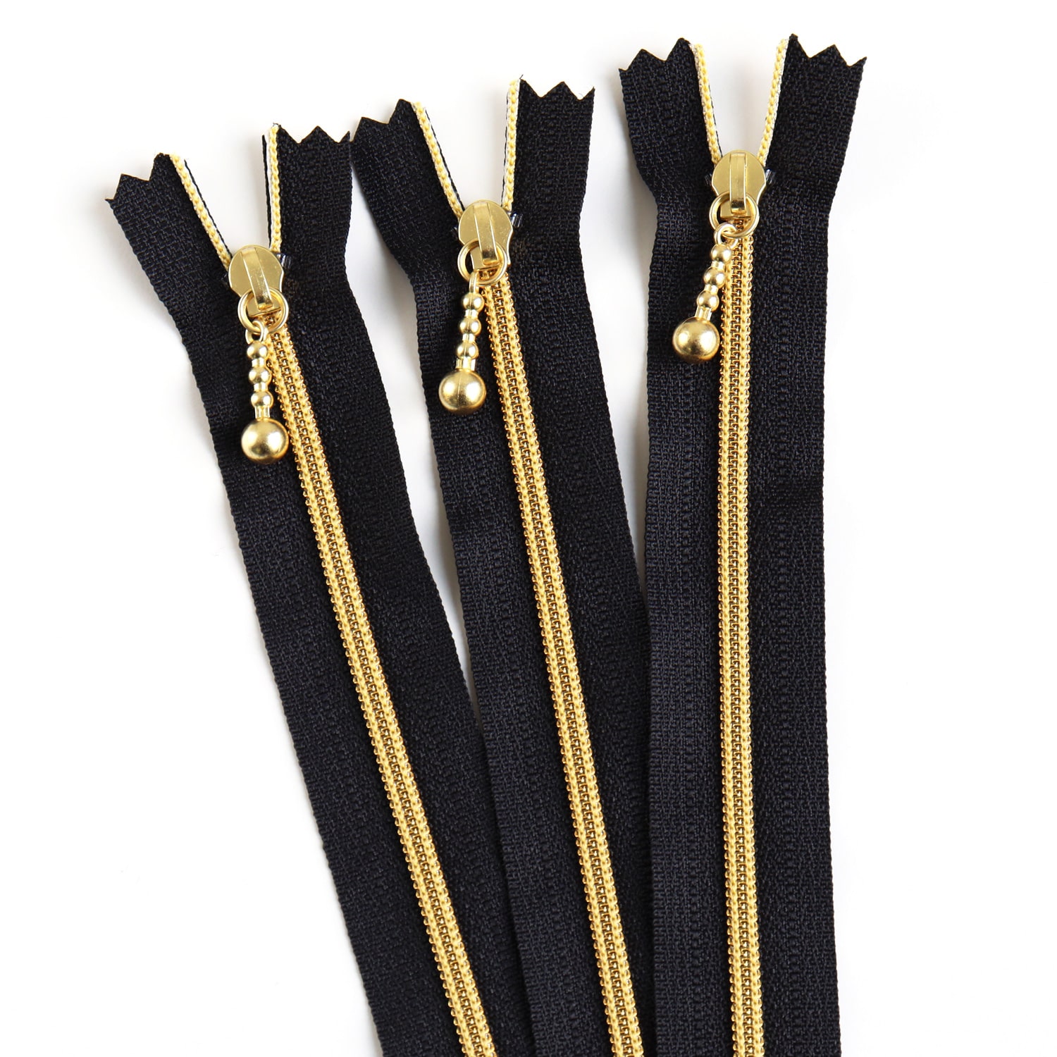 日本紐釦貿易 Y.K.K メタリオンファスナー 3C 20cm黒/ゴールド 3本入 3CM20-1G （ご注文単位1束）【直送品】