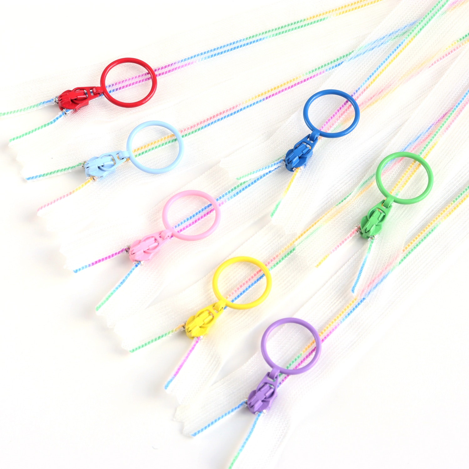 日本紐釦貿易 Y.K.K スケルトンファスナー 25cm レインボー 7本 SKF25-7MIX (ご注文単位1セット)【直送品】