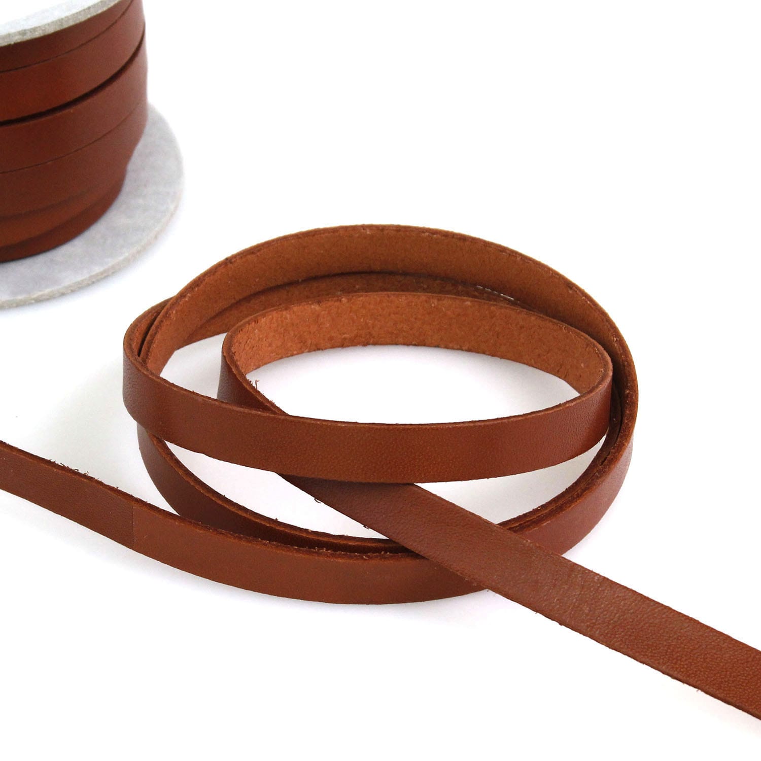 日本紐釦貿易 ヌメ革テープ 10mm 長さ10m巻 茶 MTLS1010-3 （ご注文単位1巻）【直送品】