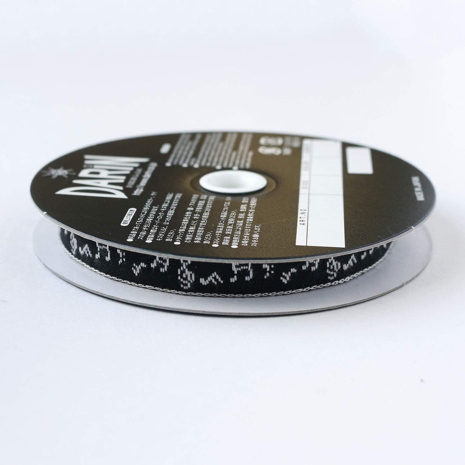 日本紐釦貿易 チロルテープ 音符 5m巻 巾約11mm DAI144-42-9-5M (ご注文単位1巻)【直送品】