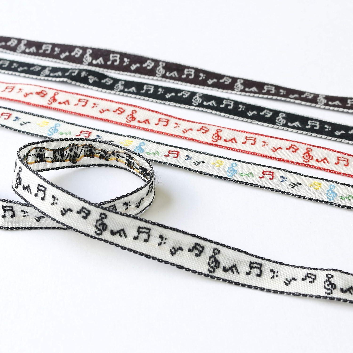 日本紐釦貿易 チロルテープ 音符 5m巻 巾約11mm DAI144-42-9-5M (ご注文単位1巻)【直送品】