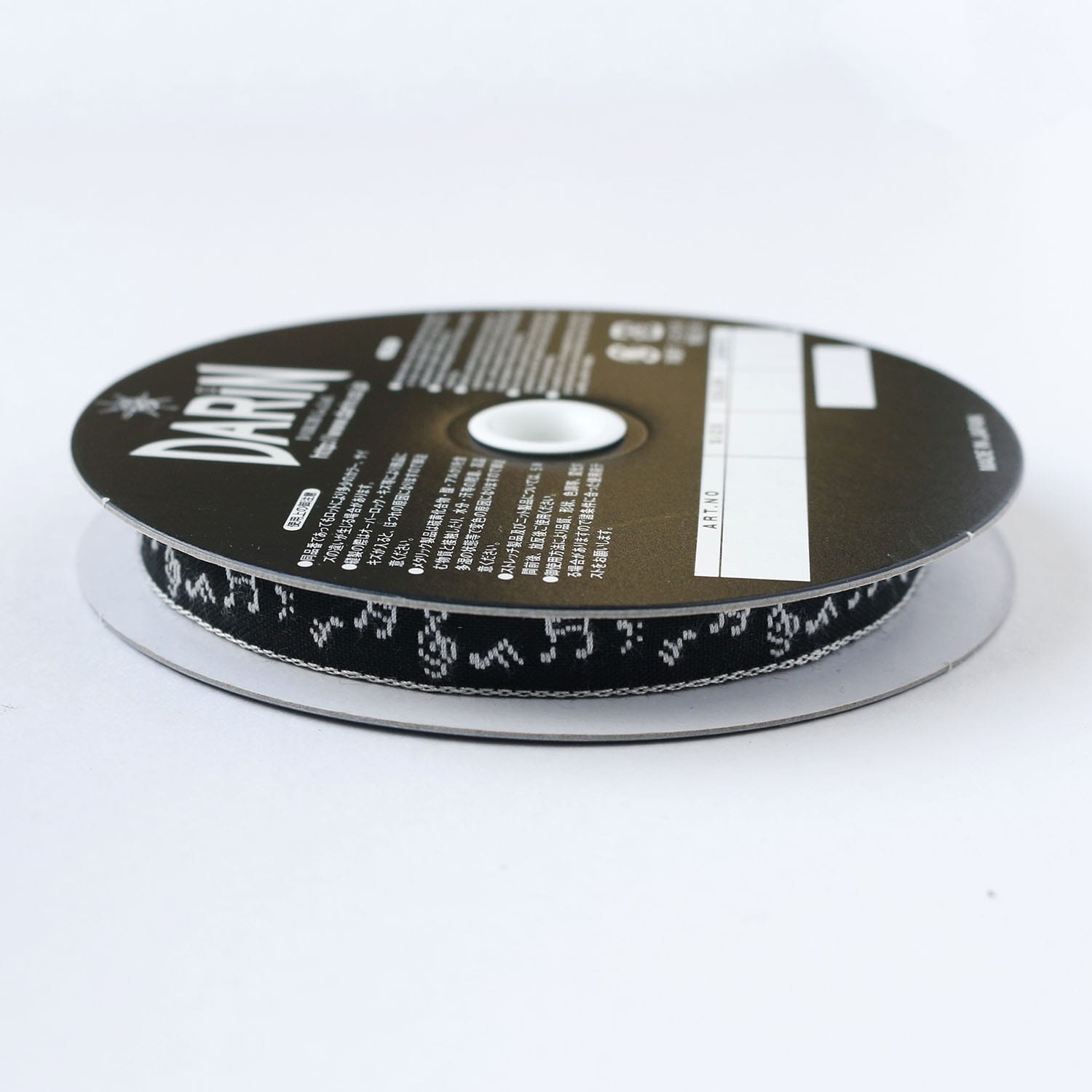 日本紐釦貿易 チロルテープ 音符 5m巻 巾約11mm DAI144-42-9-5M (ご注文単位1巻)【直送品】